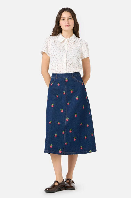 Image of a model wearing Skirts. Product name - Radish Embroidered Denim Skirt in Blue Denim colour by brand - Princess Highway