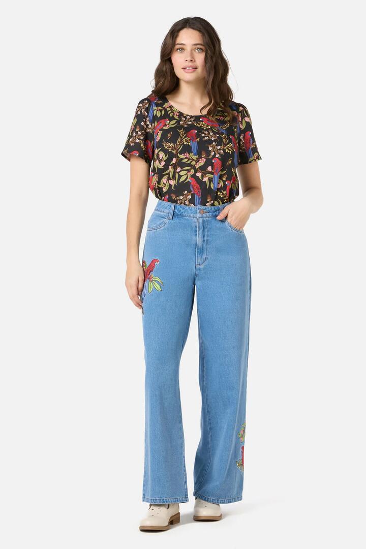 Image of a model wearing Denim. Productname: Rosella Embroidered Jean in Blue Denim colour by brand - Princess Highway