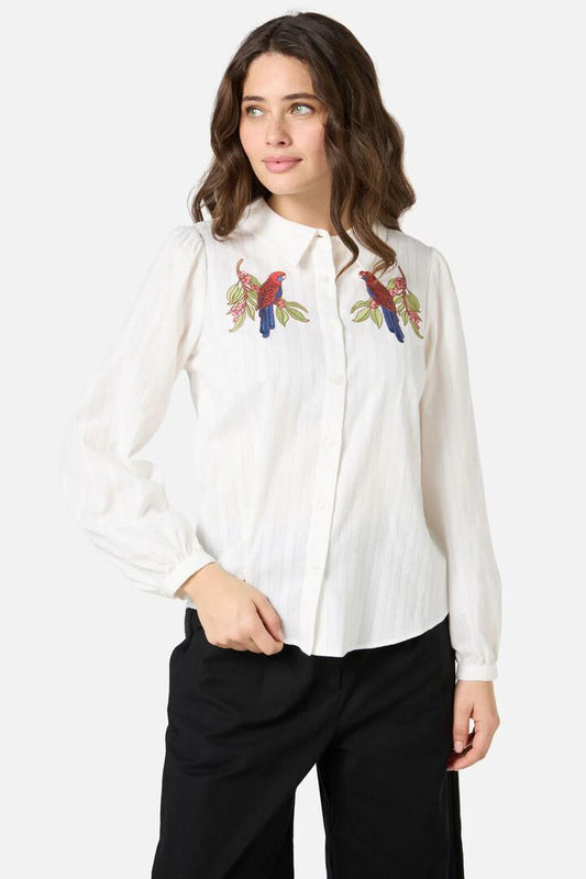 Image of a model wearing Tops. Productname: Rosella Embroidered Shirt in Cream colour by brand - Princess Highway