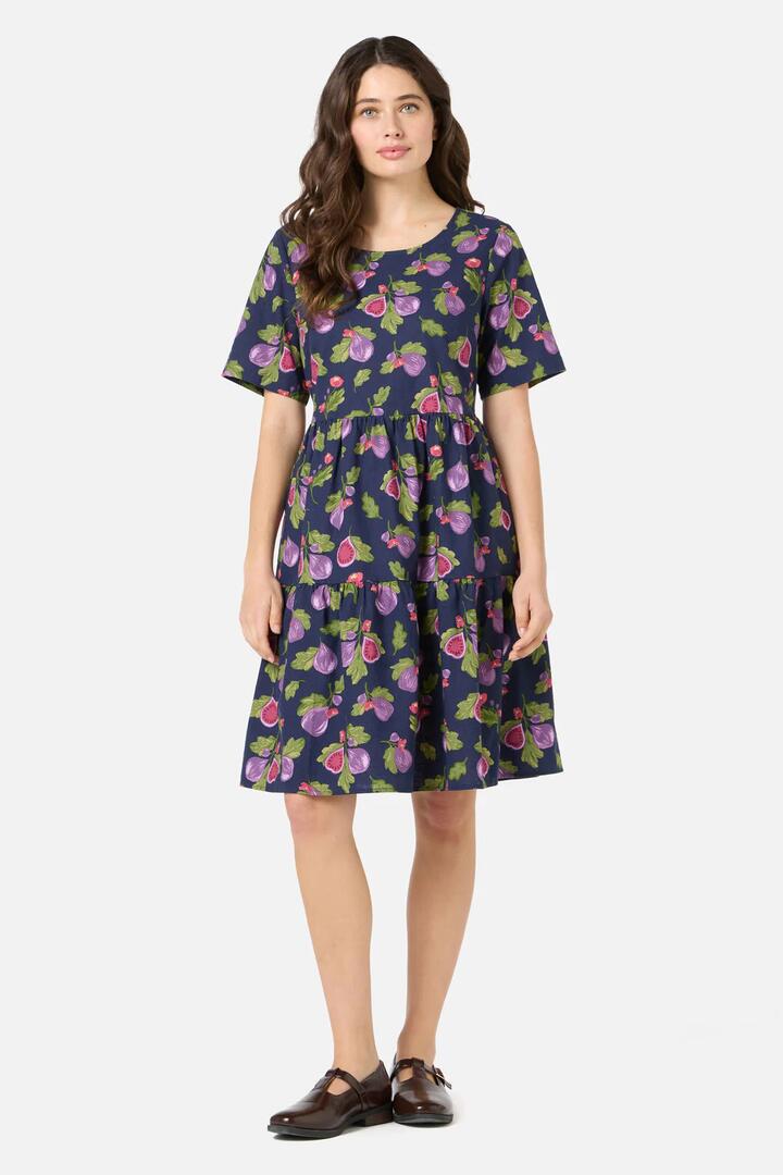 Image of a model wearing Dress. Productname: Fig Tiered Smock Dress in Navy colour by brand - Princess Highway