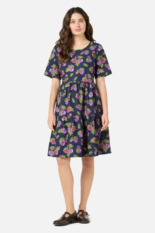 Image of a model wearing Dress. Productname: Fig Tiered Smock Dress in Navy colour by brand - Princess Highway