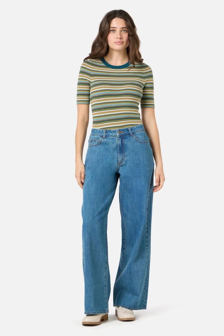 Image of a model wearing Denim. Productname: Ivy Mid Rise Striaght Leg Jean in Blue Denim colour by brand - Princess Highway
