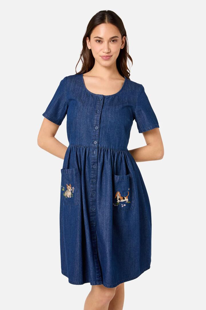 Image of a model wearing Dress. Productname: Cute Dogs Embroidered Dress in Mid Denim colour by brand - Princess Highway