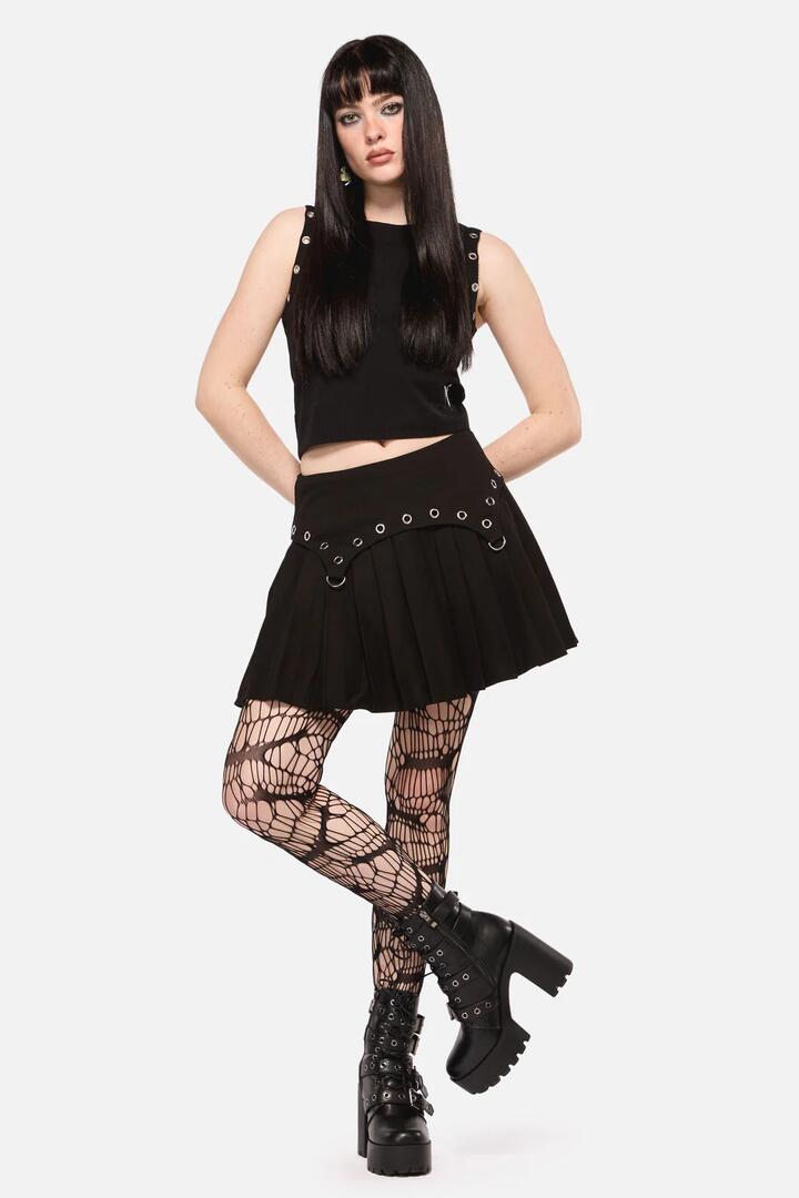 Image of a model wearing Skirts. Productname: Defiant Grunge Trim Skort in Black colour by brand - Dangerfield