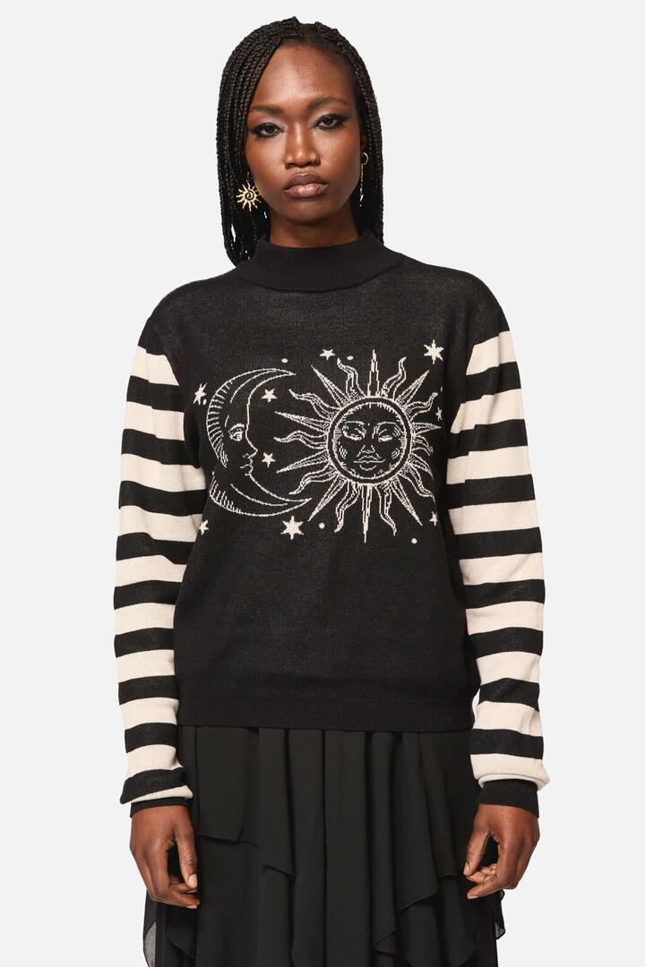 Image of a model wearing Tops. Product name - Sun And Moon Stripe Sleeve Uns Knit in Black/Cream colour by brand - Black Friday