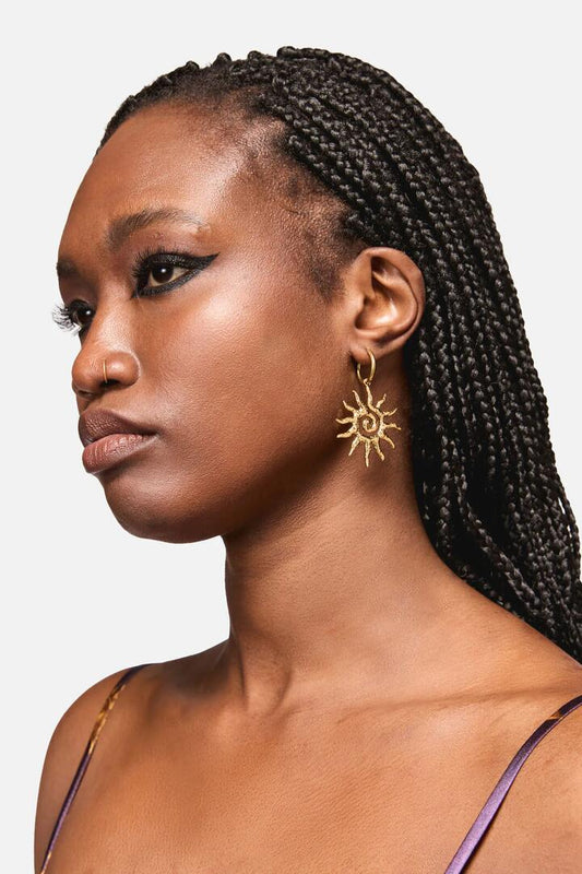 Image of Earrings. Productname: Swirling Sun Earrings in Gold colour by brand - Black Friday