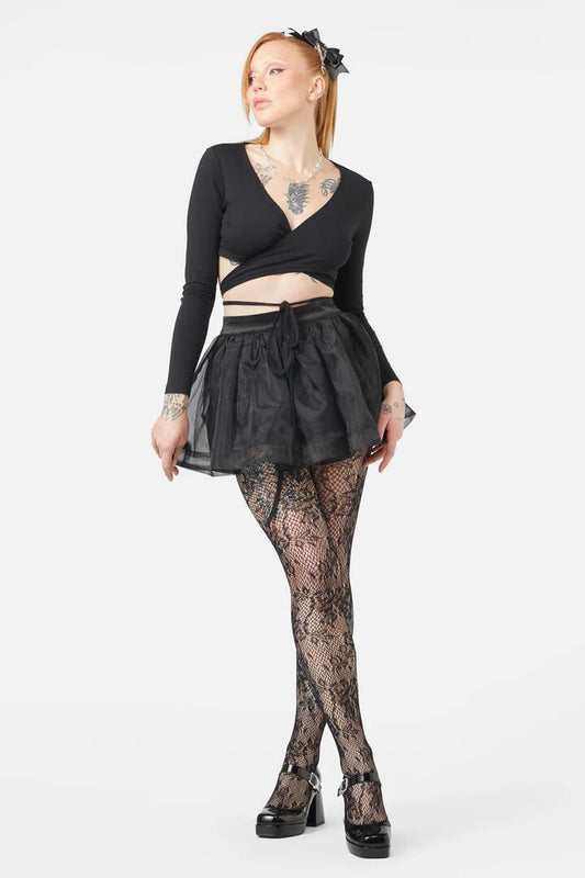 Image of a model wearing Skirts. Productname: Slumber Party Skort in Black colour by brand - Dangerfield