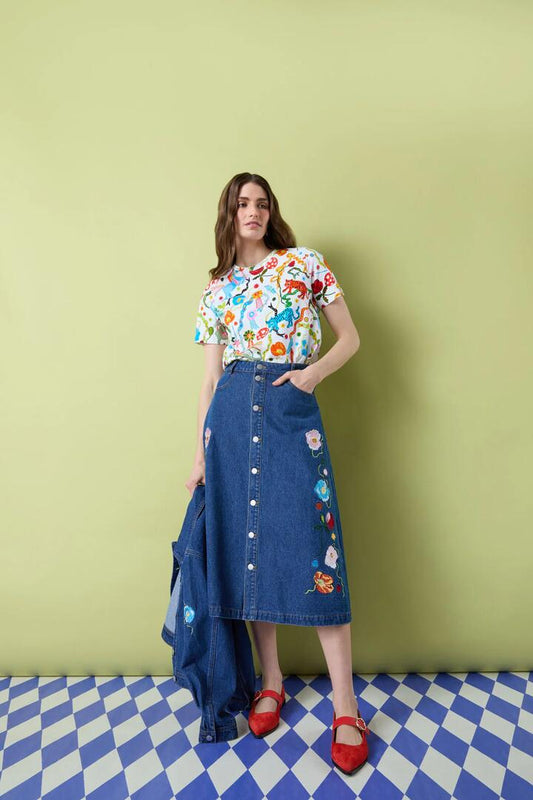 Image of a model wearing Denim. Productname: Parade Denim Skirt in Mid Blue colour by brand - Gorman