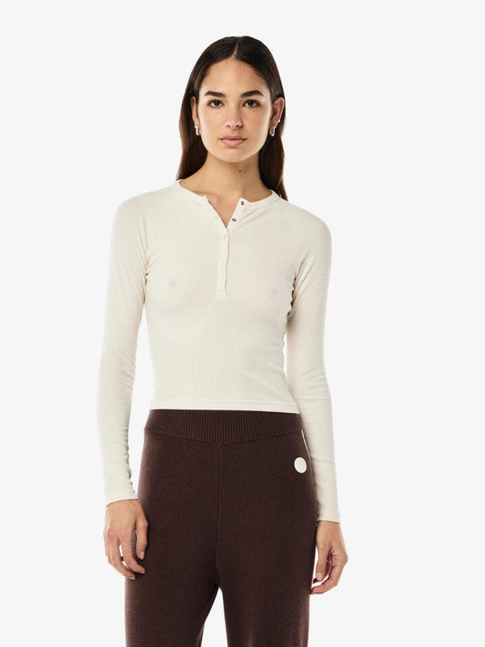 Image of a model wearing Tops. Productname: Pe Nation Prive Rib Long Sleeve Tee in Whisper White Cream colour by brand - Pe Nation
