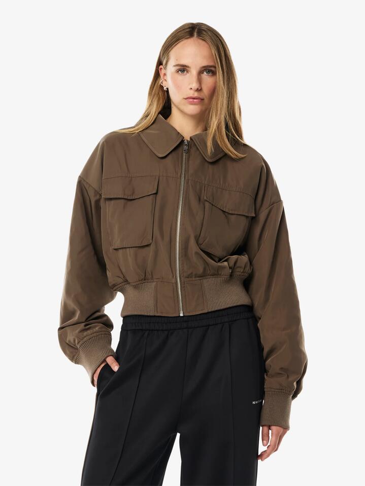 Image of a model wearing Outerwear. Productname: Pe Nation Pursuit Bomber in Walnut Brown colour by brand - Pe Nation