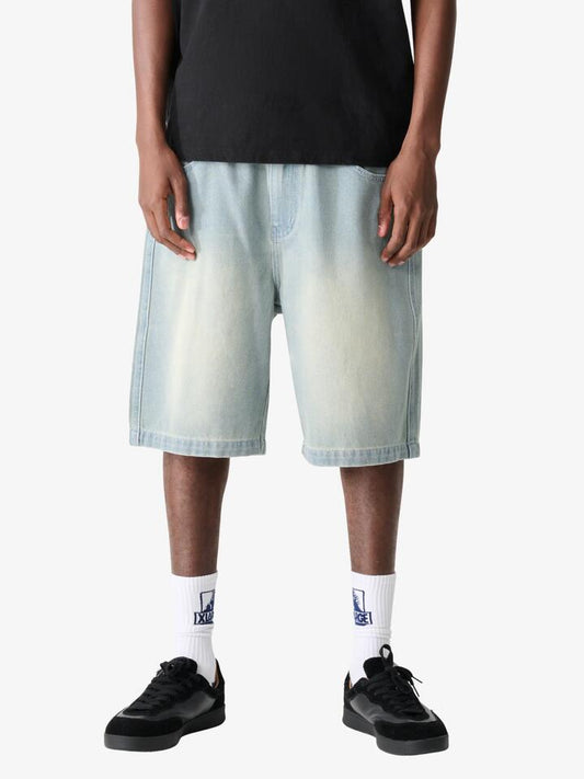 Image of a model wearing Denim. Productname: Xlarge Bull Denim 91 Short in WASHED SEA colour by brand - Xlarge