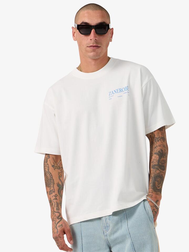 Image of a model wearing Tops. Productname: Zanerobe Ceramic Box Tee in Vintage White colour by brand - Zanerobe