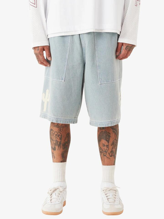 Image of a model wearing Shorts. Productname: Zanerobe Design House Denim Short in Lt Blue colour by brand - Zanerobe