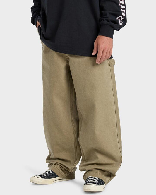 Image of a model wearing Pants. Productname: Quiksilver - Mens Mercury Straight Out Pants - Elmwood - in Elmwood colour by brand - Quiksilver