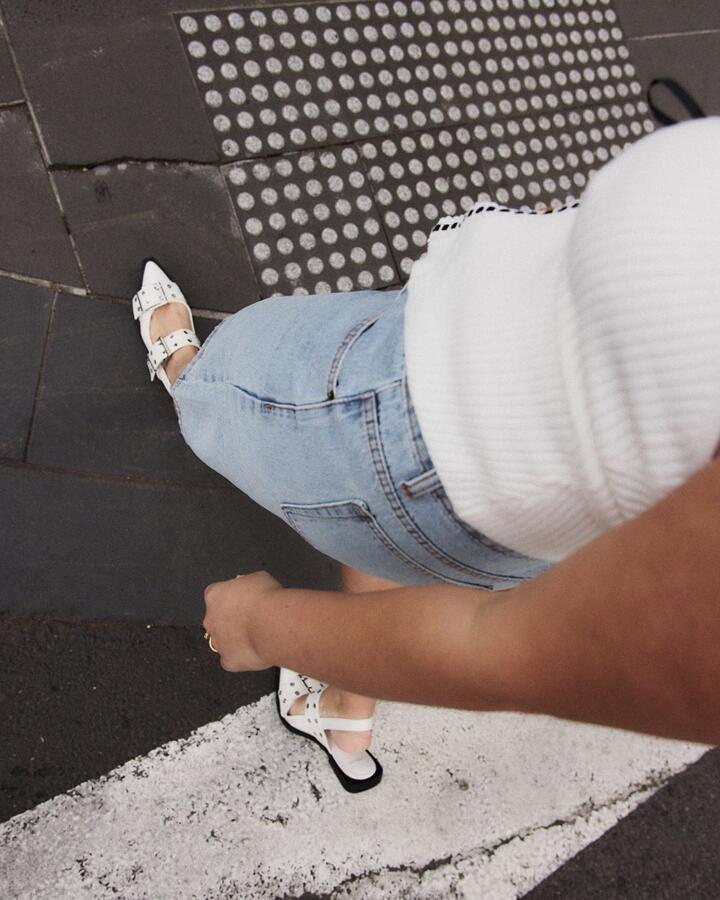 Image of Flats. Product name - Zimbi White Patent Slip Ons in White colour by brand - Novo