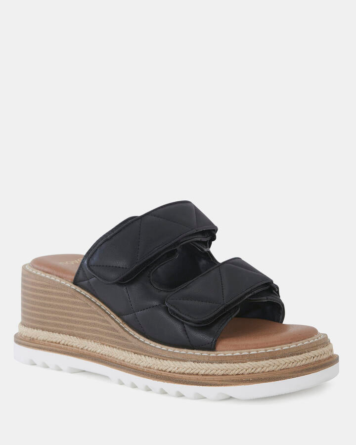 Image of Sandals. Product name - Winsley Black Wedge Sandals in Black colour by brand - Novo