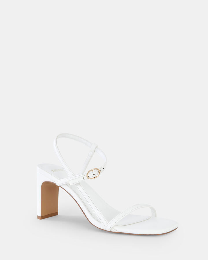 Image of Heels. Product name - Ujala White Slim Rectangular Heels in Multi colour by brand - Novo
