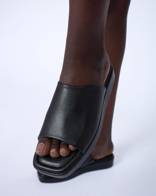 Image of Sandals. Product name - Byte Black Wedge Sandals in Black colour by brand - Novo
