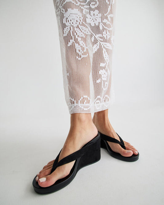Image of Sandals. Product name - Baci Black Suede Wedge Sandals in Black colour by brand - Novo