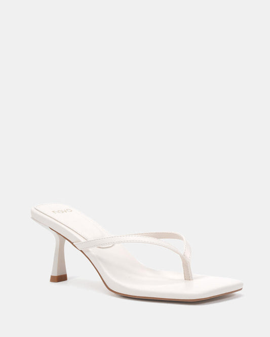 Image of Heels. Product name - Zania White Heels in Multi colour by brand - Novo