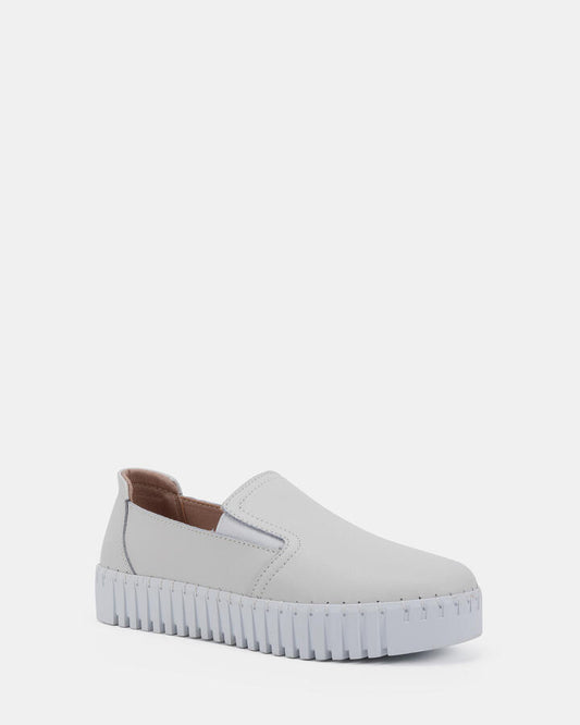 Image of Sneakers. Product name - Haven Rivers White Slip On Sneakers in Multi colour by brand - Novo