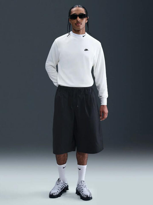 Image of a model wearing Shorts. Productname: Nike Men's NK Club Seoul Short in Black/Black colour by brand - Nike