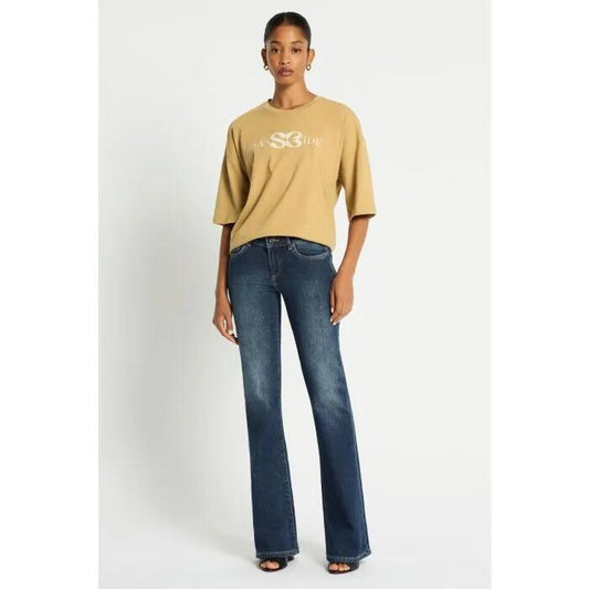 Image of a model wearing Tops. Productname: Ryder Logo Tee in HONEY/DAISY colour by brand - sass and bide