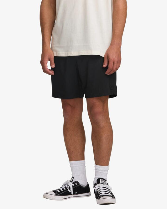 Image of a model wearing Shorts. Productname: Billabong - Mens Surftek Hybrid Shorts - Black - in Black colour by brand - Billabong