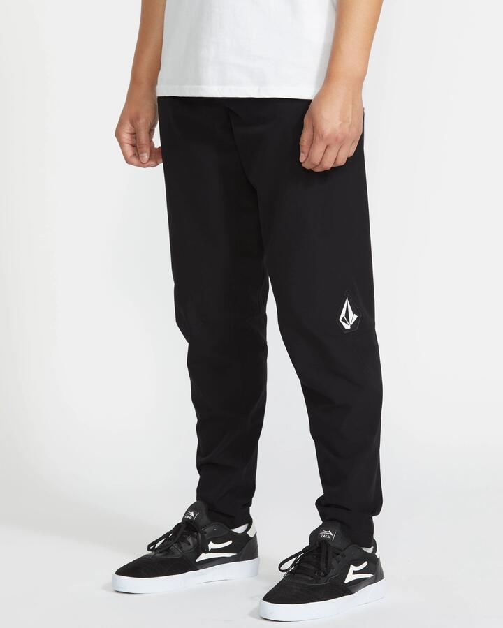 Image of a model wearing Pants. Productname: Volcom Mens Trail Ripper Pants Black - in Black colour by brand - Volcom