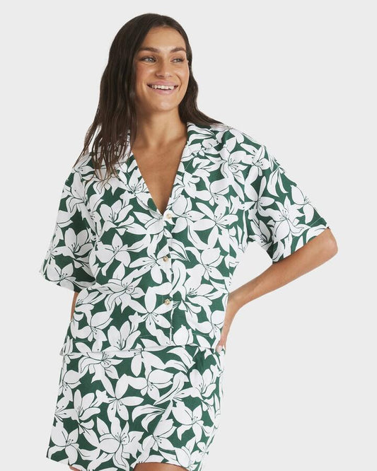 Image of a model wearing Tops. Productname: Roxy - Womens Khloe Salty Water Short Sleeve Shirt - Evergreen - in Evergreen colour by brand - Roxy