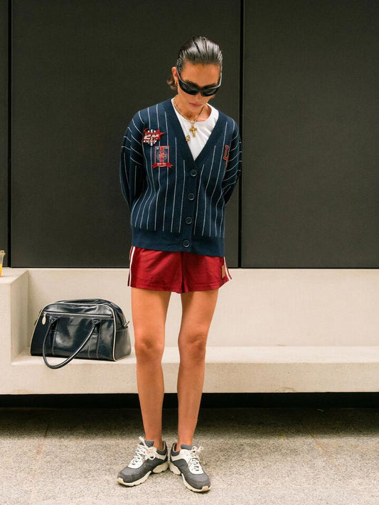Image of a model wearing Outerwear. Productname: Ksubi Dean Cardigan in NAVY PINSTRIPE colour by brand - Ksubi