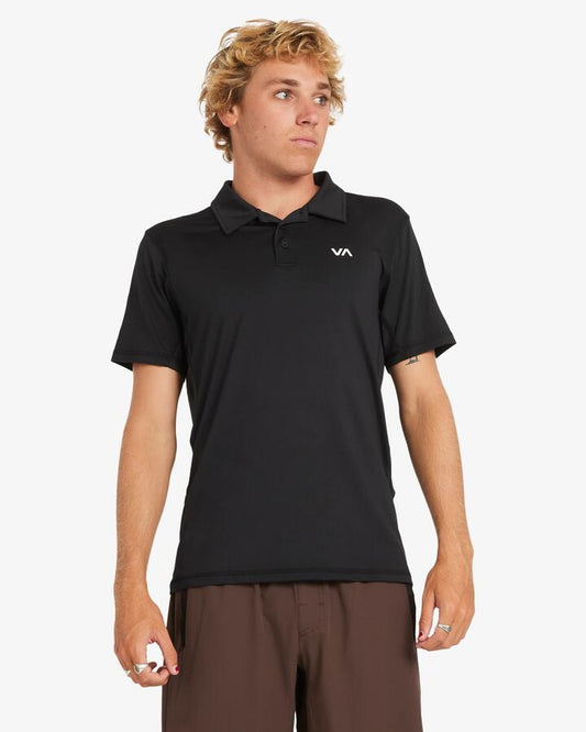 Image of a model wearing Tops. Productname: RVCA - Mens Sport Vent Polo - Black - in Black colour by brand - RVCA