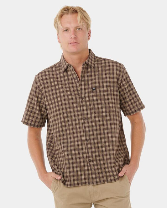 Image of a model wearing Tops. Productname: Rip Curl Mens Classic Surf Check Short Sleeve Shirt Khaki - in Khaki colour by brand - Rip Curl