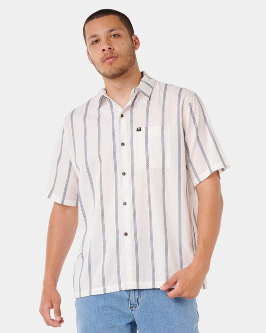 Image of a model wearing Tops. Productname: Rip Curl - Mens Classic Surf Stripe Short Sleeve Shirt - Bone - in Bone colour by brand - Rip Curl