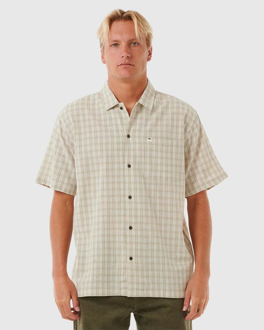 Image of a model wearing Tops. Productname: Rip Curl Mens Classic Surf Check Short Sleeve Shirt Bone - in Bone colour by brand - Rip Curl