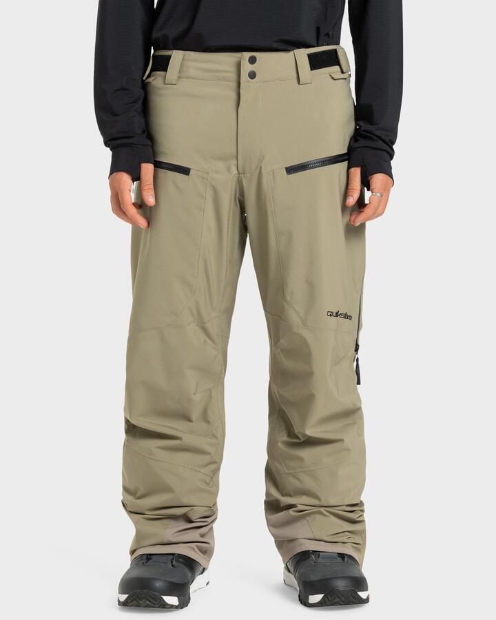 Image of a model wearing Pants. Product name - Quiksilver Mens Paramo Stretch 20K Snow Pants Fallen Rock in Fallen Rock colour by brand - Quiksilver