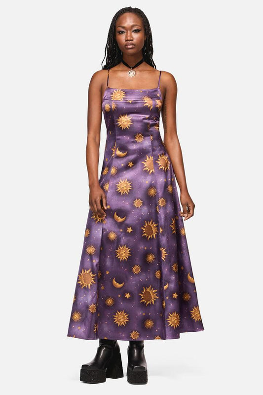 Image of a model wearing Dress. Productname: Cosmic Light Whimsy Goth Dress in Purple colour by brand - Black Friday