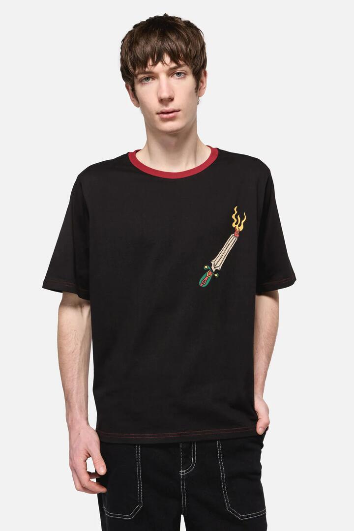 Image of a model wearing Tops. Productname: Dangerous Grunge Crop Tee in Black colour by brand - Dangerfield