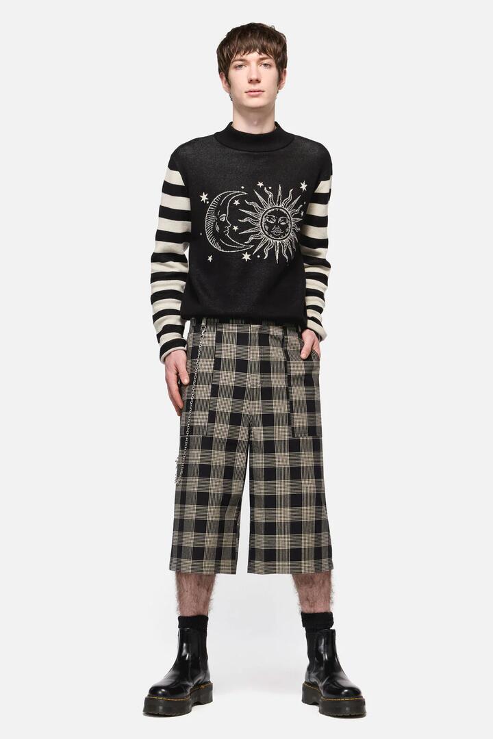 Image of a model wearing Shorts. Productname: Crypt Baggy Shorts in Black/Beige colour by brand - Black Friday