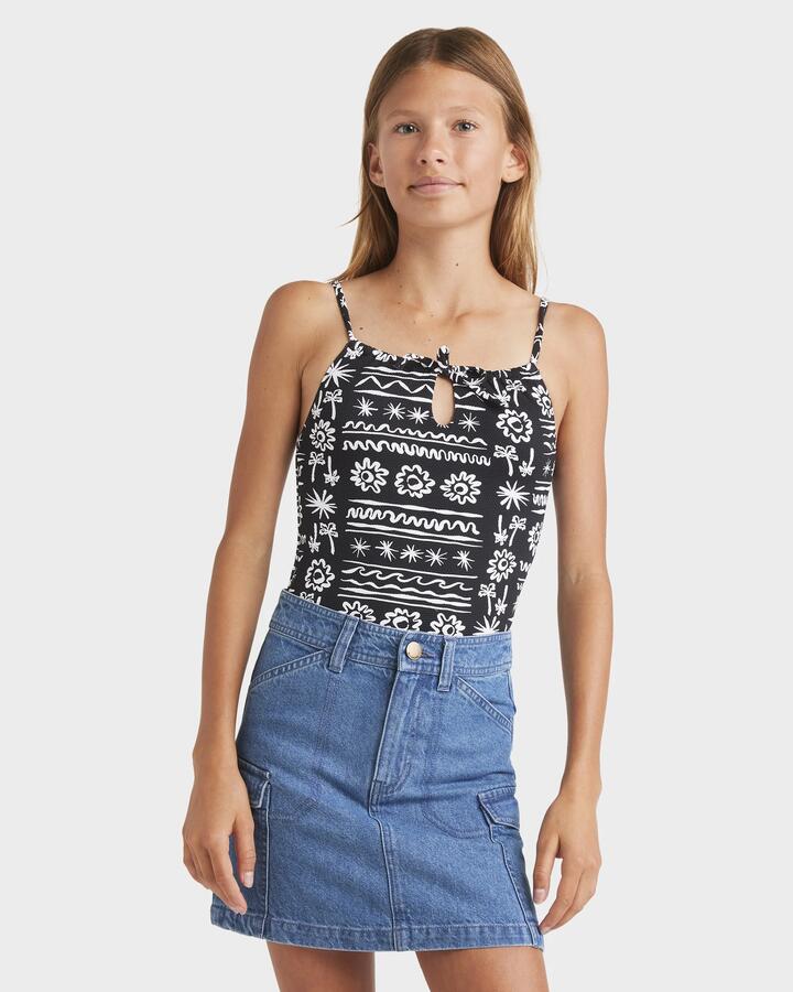 Image of a model wearing Skirts. Productname: Billabong Girls 6-16 Hilary Carko Denim Skirt Salt Washed - in Salt Washed colour by brand - Billabong