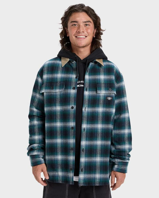 Image of a model wearing Tops. Product name - Quiksilver Mens Shadow Check Long Sleeve Shirt Orion Blue Desert Shadow in Orion Blue Desert Shadow colour by brand - Quiksilver