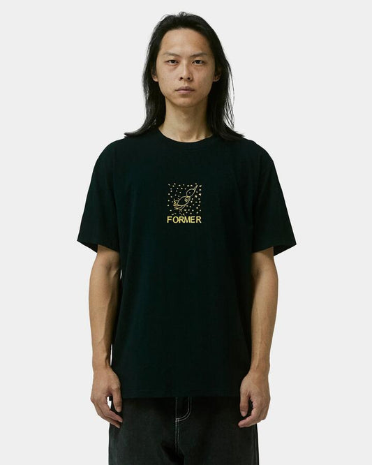 Image of a model wearing Tops. Productname: Former Mens Free Crux T-Shirt Black - in Black colour by brand - Former