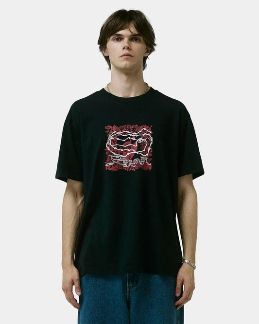 Image of a model wearing Tops. Productname: Former Mens Proscribe T-Shirt Black - in Black colour by brand - Former