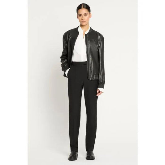 Image of a model wearing Pants. Productname: Razor Pant in Black colour by brand - sass and bide