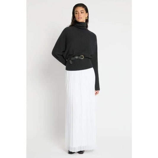 Image of a model wearing Skirts. Productname: White Sands Skirt in Ivory colour by brand - sass and bide