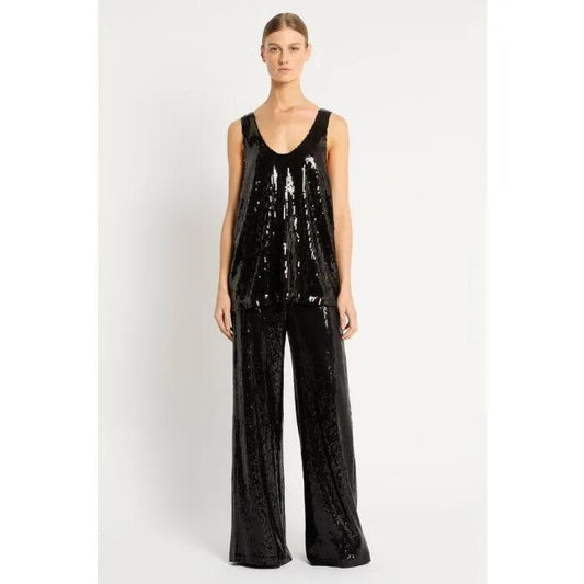 Image of a model wearing Tops. Productname: Firefall Top in Black colour by brand - sass and bide