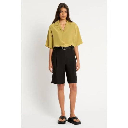 Image of a model wearing Shorts. Productname: Amps Short in NOIR colour by brand - sass and bide