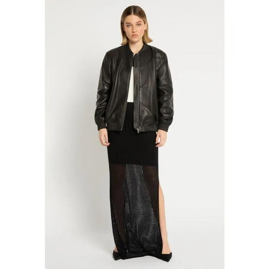 Image of a model wearing Skirts. Productname: Laddered Knit Skirt in Black colour by brand - sass and bide