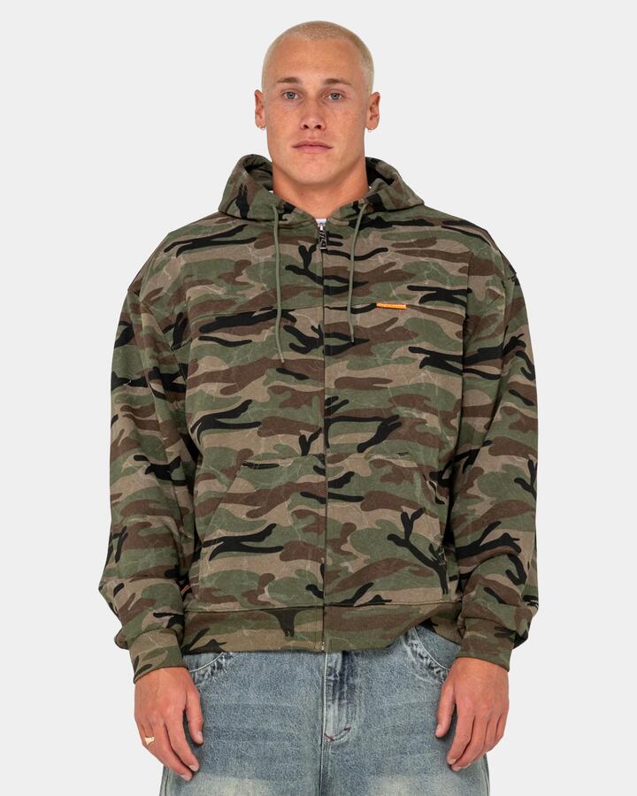 Image of a model wearing Outerwear. Productname: rusty Mens Rambo Zip Up Hoodie Camo - in Camo colour by brand - Rusty
