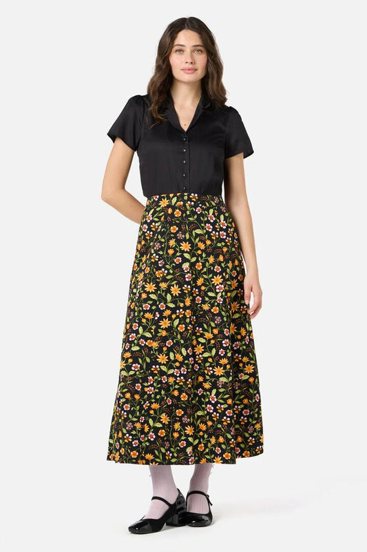 Image of a model wearing Skirts. Productname: Alyssa Floral Midi Skirt in Black colour by brand - Princess Highway